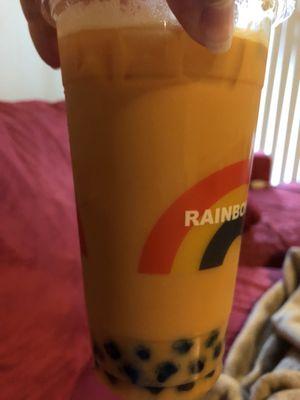 After 10 minutes of arguing and two incorrect drinks later, he finds the right powder . Yup Thai tea is orange, not brown.