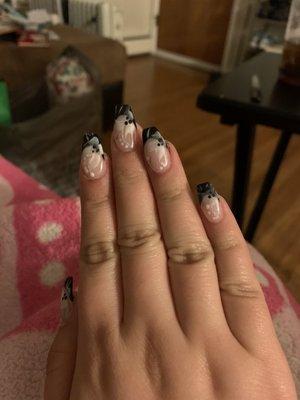 Black tips with whitish pink flowers and a bit of silver absolutely beautiful!!!