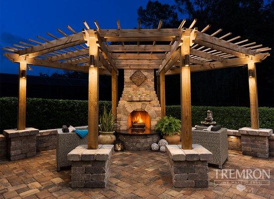 round cedar pergola with fire pit