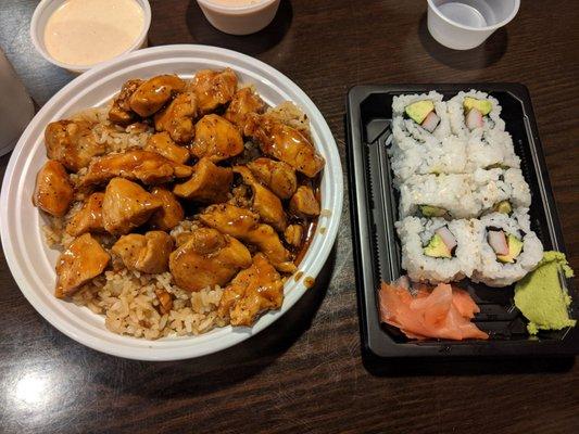 Chicken teriyaki bowl with california roll. They give lots of yum yum sauce.