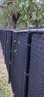 Fence damage from tree landing on it