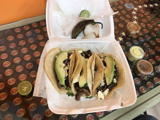 3 tacos de fajita w/ cilandeo, queso fresco and aguacate. they were good! freshly cooked and both salsa added just the right spicy touch!