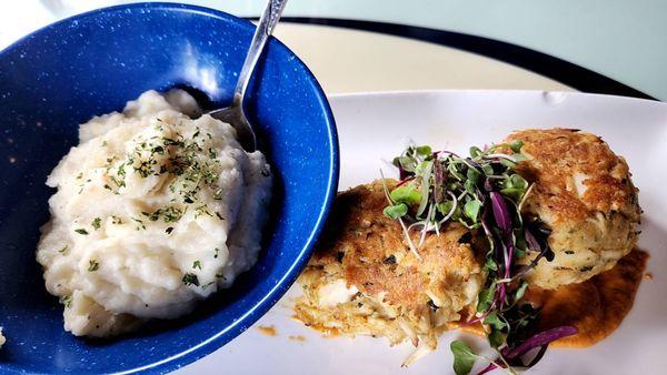 crab cakes with mashed potatoes as a side