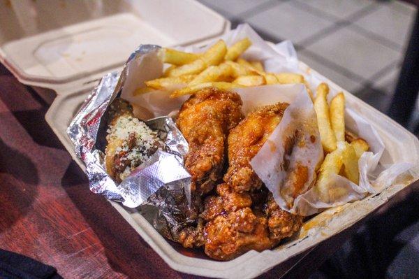 Perry wings and garlic parmesan wings with fries