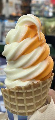 Orange/vanilla swirl cone