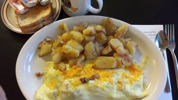 Omelet and home fries at Mary's Miracle Restaurant in Tampa