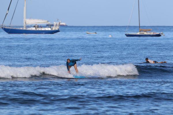 My mother in law getting up on the break of a wave