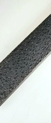 Steel flat bar with a textured hammering