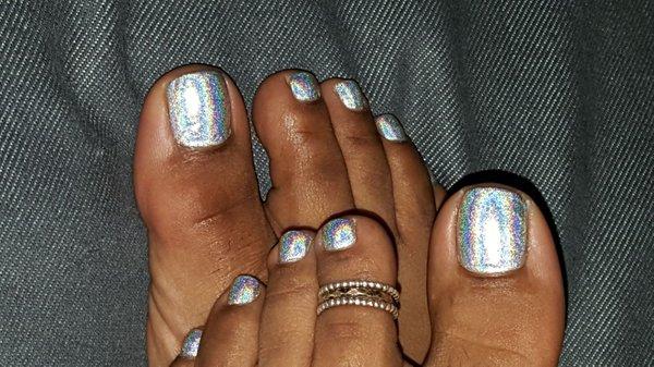 Mary did my pedicure with holographic paint.  My heels are nice and smooth!!!