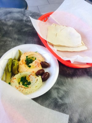 Cilantro hummus and roasted red pepper hummus made fresh!