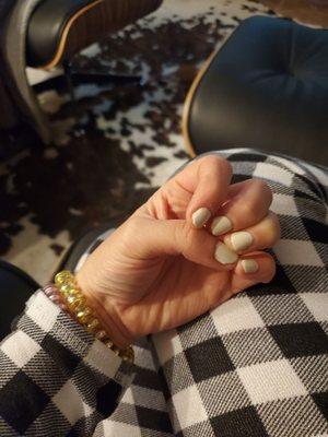 Well manicured short nails with white neutral paint. CiCi thank you!!