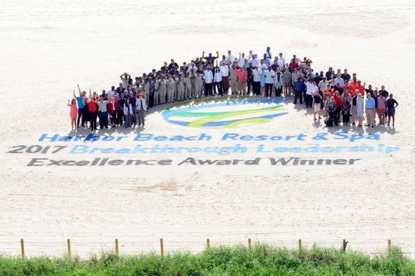 Corporate Shoot: Marriott Properties, Photographing on the 7th floor looking down at the beach logo and design with staff. Ft Lauderdale, FL