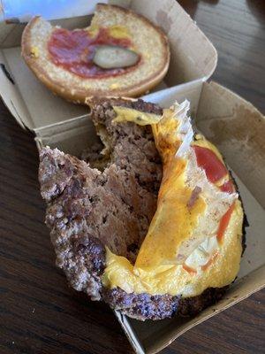 Quarter pounder with cheese - employee left the paper on either the cheese or the patty.