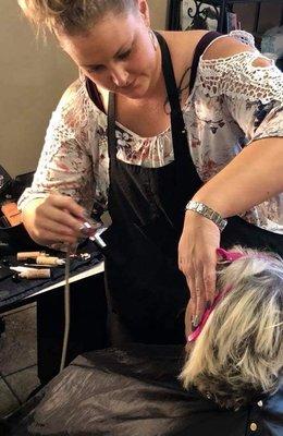 Me in action, using Airbrush Foundation when i apply the base of the makeup.