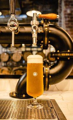 Side-pull pours of oak-conditioned Pilsner.