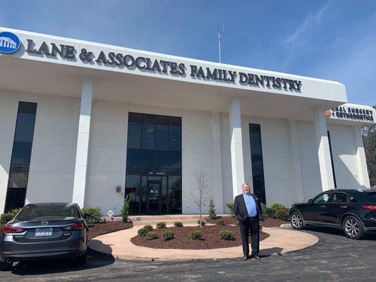 Dr. Lane in front of our new Durham Miami office on opening day!