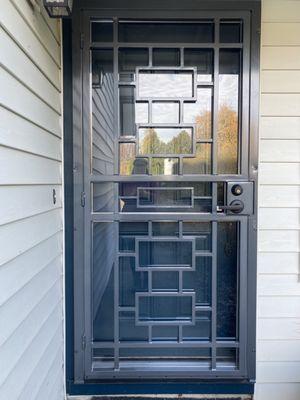 Door with glass panel on top.