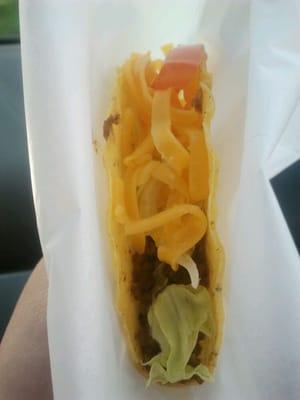 Taco wrapped in wax paper