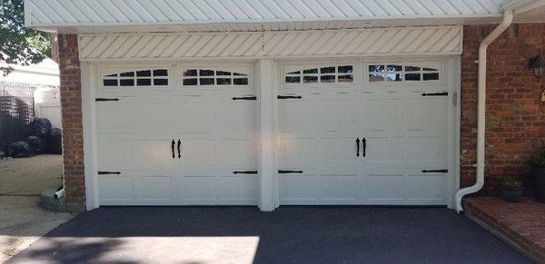 Two carriage style garage doors installed in Sound Beach along with a chamberlain WIFI compatible garage door opener,key pad, and 2 remotes.