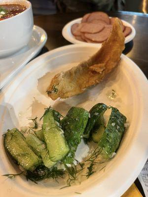 Cucumber salad, Fried fish and cut up salami