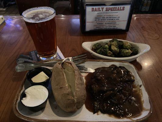 Hamburger Steak and 2 sides with a S..N. Celebration craft draft.