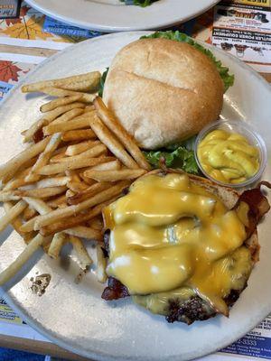 Bacon cheeseburger with shoestring fries.