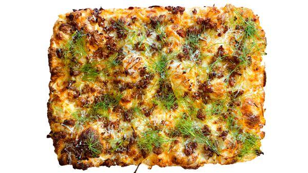 Roasted fennel, shredded mozzarella and fontina cheeses, hot Italian Sausage, topped with fresh Romano cheese and fennel fronds.