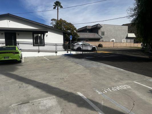 Look at the loads of parking spaces as well as the wheelchair  ramp! Love this new office!