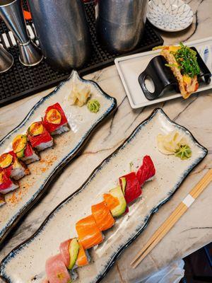 Crunchy spicy tuna roll, rainbow roll, and spicy tuna taco