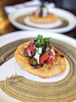 Kachori Chaat: stuffed crispy puff bread.