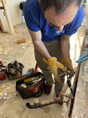 Steve soldering new copper water lines for a kitchen renovation.