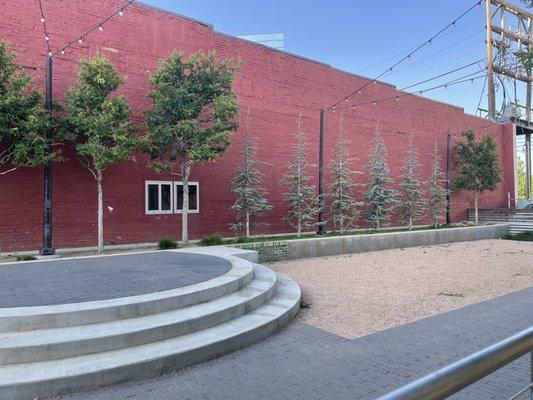 Fun stage and hangout area next to the patio