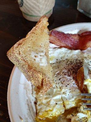 Farm fresh eggs, bacon, toast and pan fried hash browns