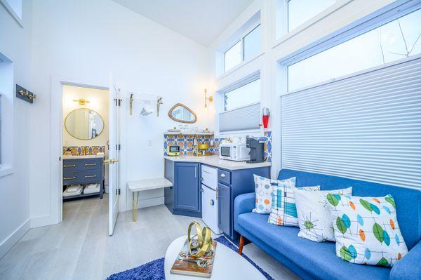 The colorful and futuristic Mid Century Mod - living room and kitchenette.