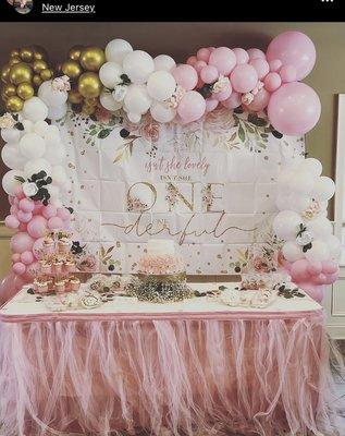 Balloon garland done by: @events.by.krystalandco Had the opportunity to set up a beautiful backdrop for a 1st birthday celebration.