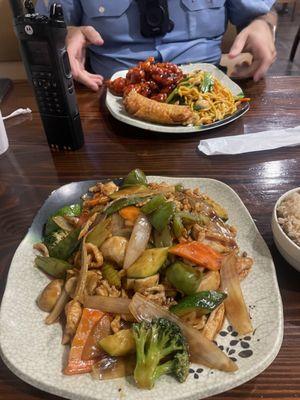 Schezuan Chicken entree (foreground) w General Tso's Chicken combo plate (background)