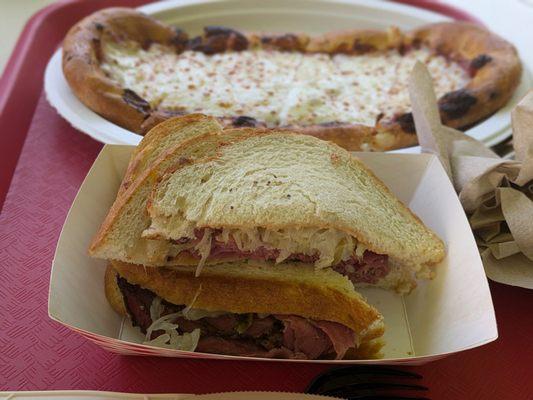 Pastrami sandwich and four cheese flatbread. Food was surprisingly good