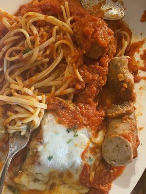 Eggplant parm with sghetti and side of italian sausage