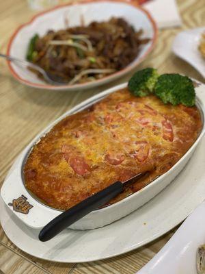 B2. Baked Pork Chop in Tomato Sauce Over Rice