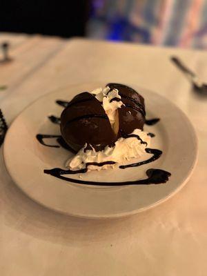 Can't recall the name of this dessert but it was vanilla ice cream served in a chocolate shell - Delicious!