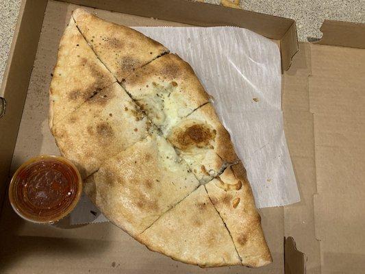 Steak and cheese calzone