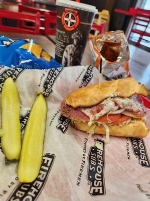 Italian sub, pickles, snacks and soda Italian Chips Medium Fountain Drink