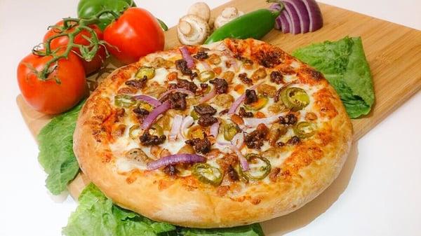 Try our delicious Mexican Pizza !