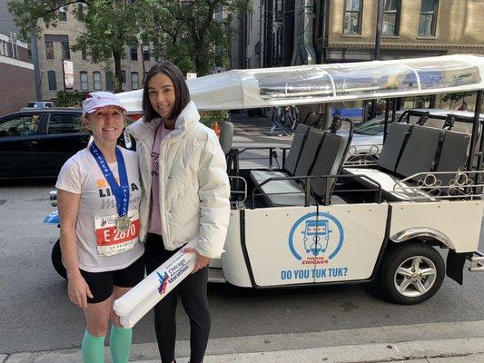 Chicago Marathon Finisher rides back to hotel in Tuk Tuk