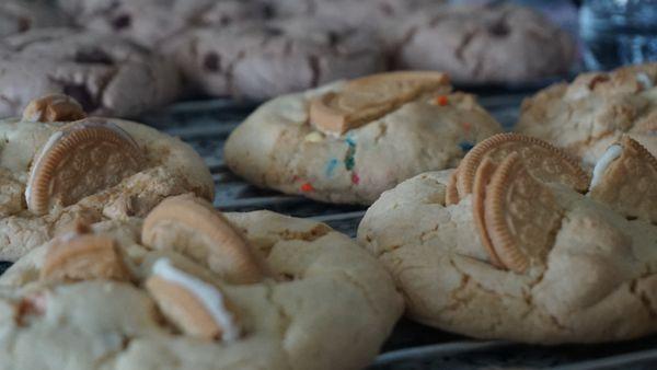 Close up on Lemon Burst and Sugar Rush. The Regular Cookie, another vegan option, is cooling in the back.