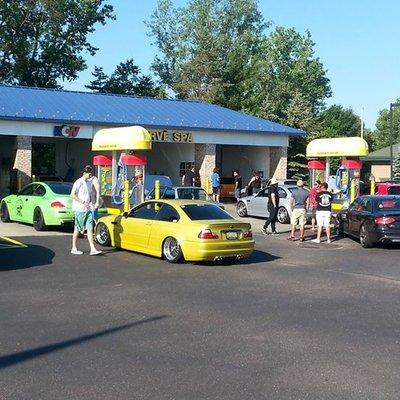 Euro hanger show cars being prepped for display. Several local car clubs regularly wash their rides here.