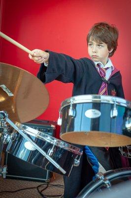 Harry Potter on drums.