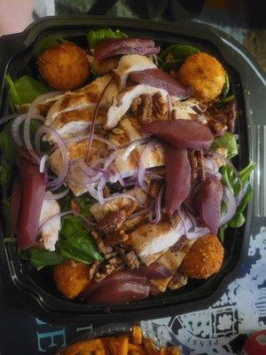 Spinach salad with fried goat cheese balls added grilled chicken. Huge amount of food.