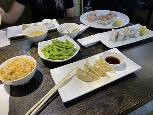 fried rice, edamame, steamed gyoza, california roll, spicy salmon tuna roll