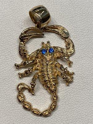 Scorpion with blue topaz eyes